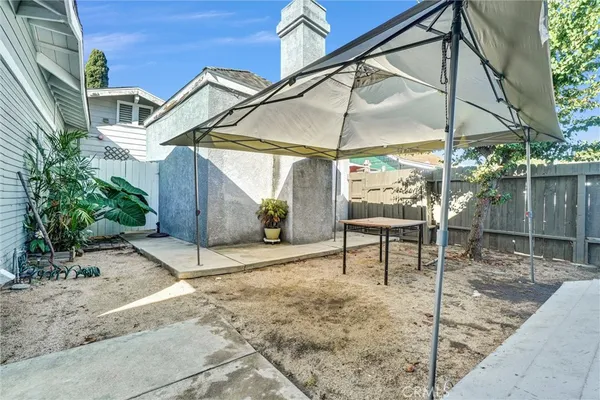 a patio with table and chairs