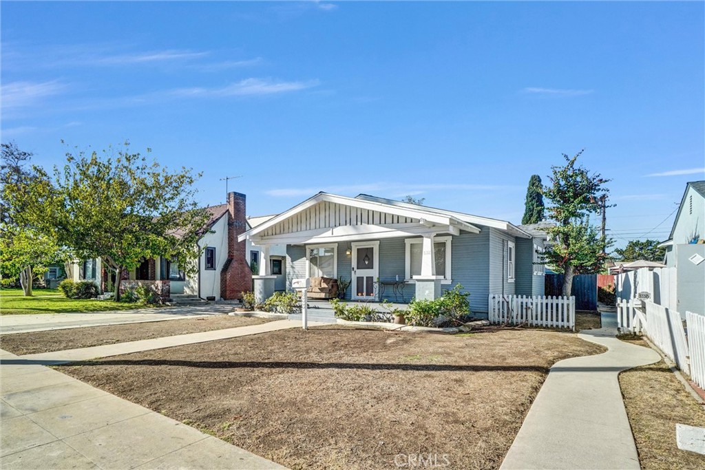 833 South Lemon Street Anaheim, CA 92805 - Photo 3 of 49 front view of a house with a yard