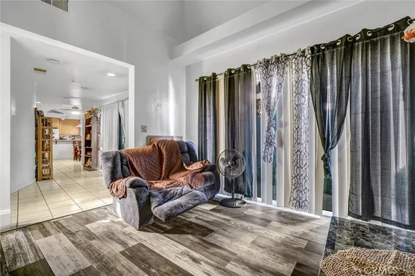 a view of a bedroom with couch and chair