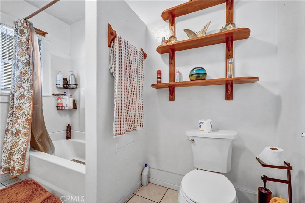 833 South Lemon Street Anaheim, CA 92805 - Photo 38 of 49 a white toilet sitting next to a bathroom sink