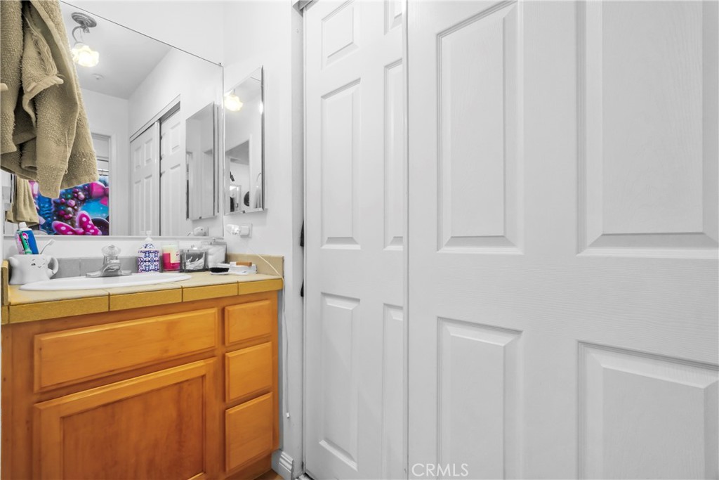 833 South Lemon Street Anaheim, CA 92805 - Photo 44 of 49 a bathroom with a sink and a mirror