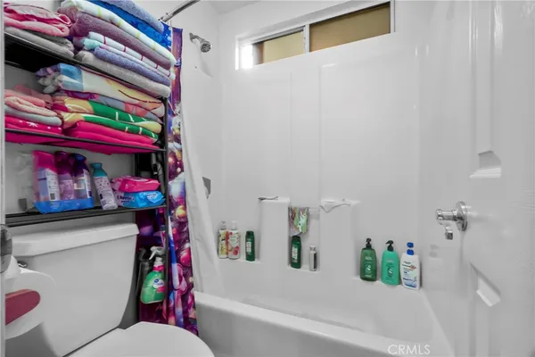 a bathroom with a sink and toilet