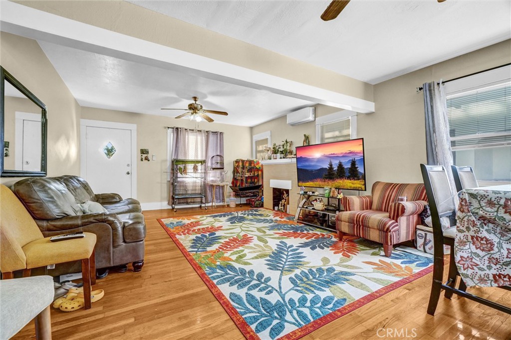 833 South Lemon Street Anaheim, CA 92805 - Photo 6 of 49 a living room with furniture a flat screen tv and a table
