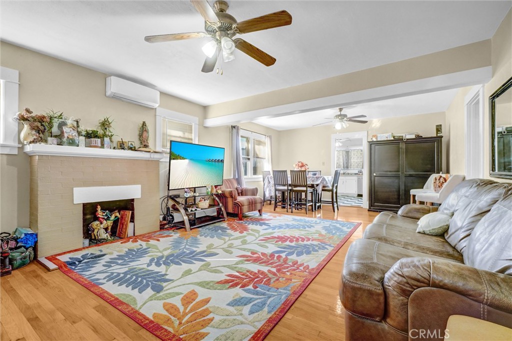 833 South Lemon Street Anaheim, CA 92805 - Photo 9 of 49 a living room with furniture and a fireplace