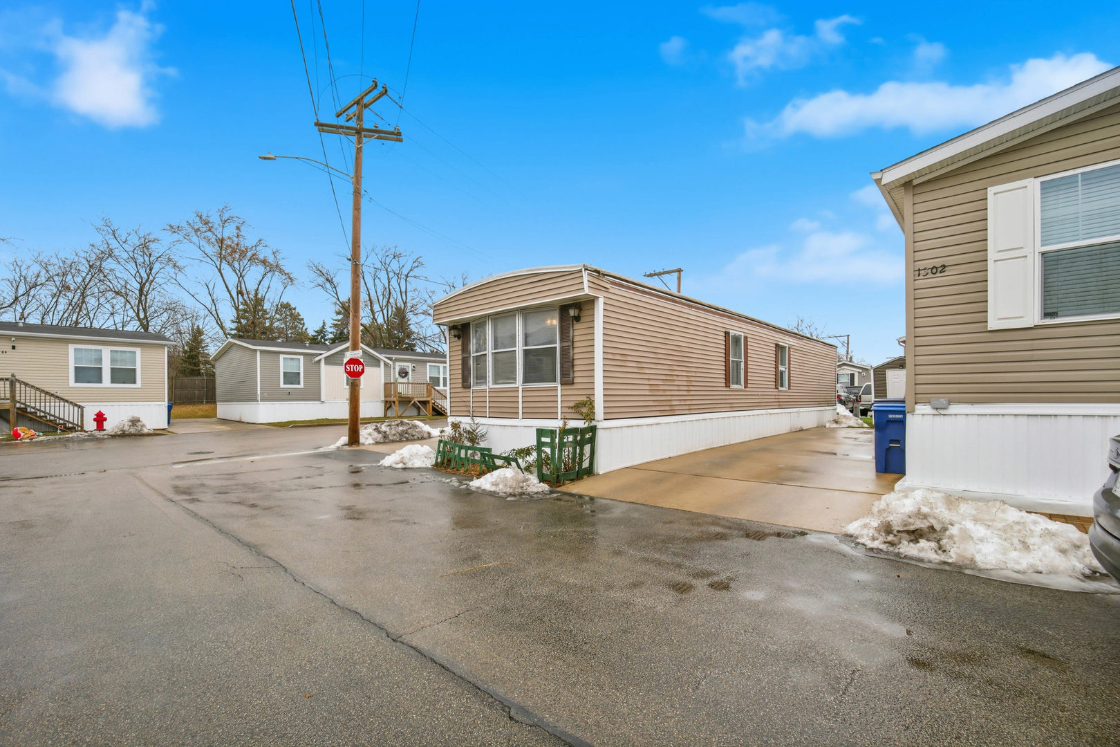 1300 West Branch Road Northfield, IL 60093 - Photo 2 of 25 a front view of a house with a garden