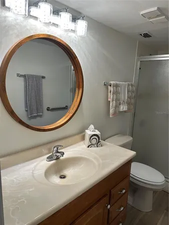 a bathroom with a sink and mirror