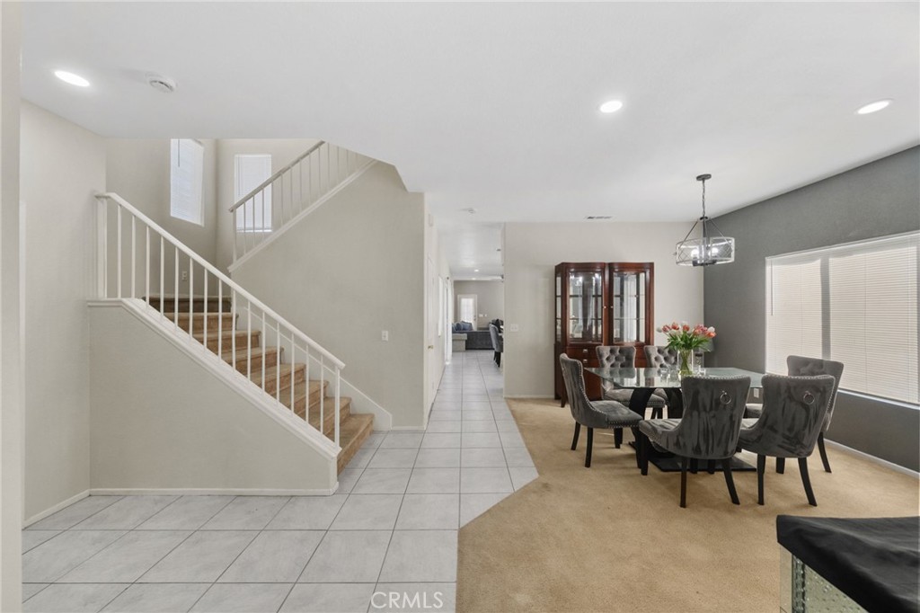 1494 Rabbit Peak Way Hemet, CA 92545 - Photo 7 of 45 a view of a dining room with furniture