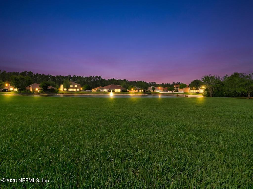 10917 Dancing Rabbit Lane Jacksonville, FL 32210 - Photo 86 of 121 Dancing Rabbit Rear Yard Twilight
