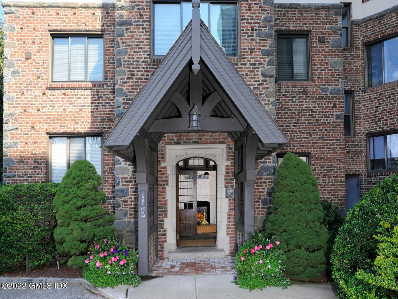front view of a house with an outdoor space