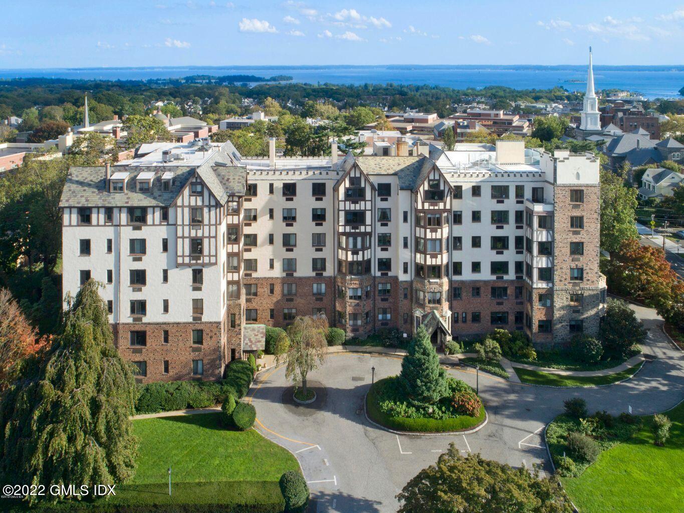 47 Lafayette Place, Unit 3H Greenwich, CT 06830 - Photo 12 of 13 a view of a city with tall buildings