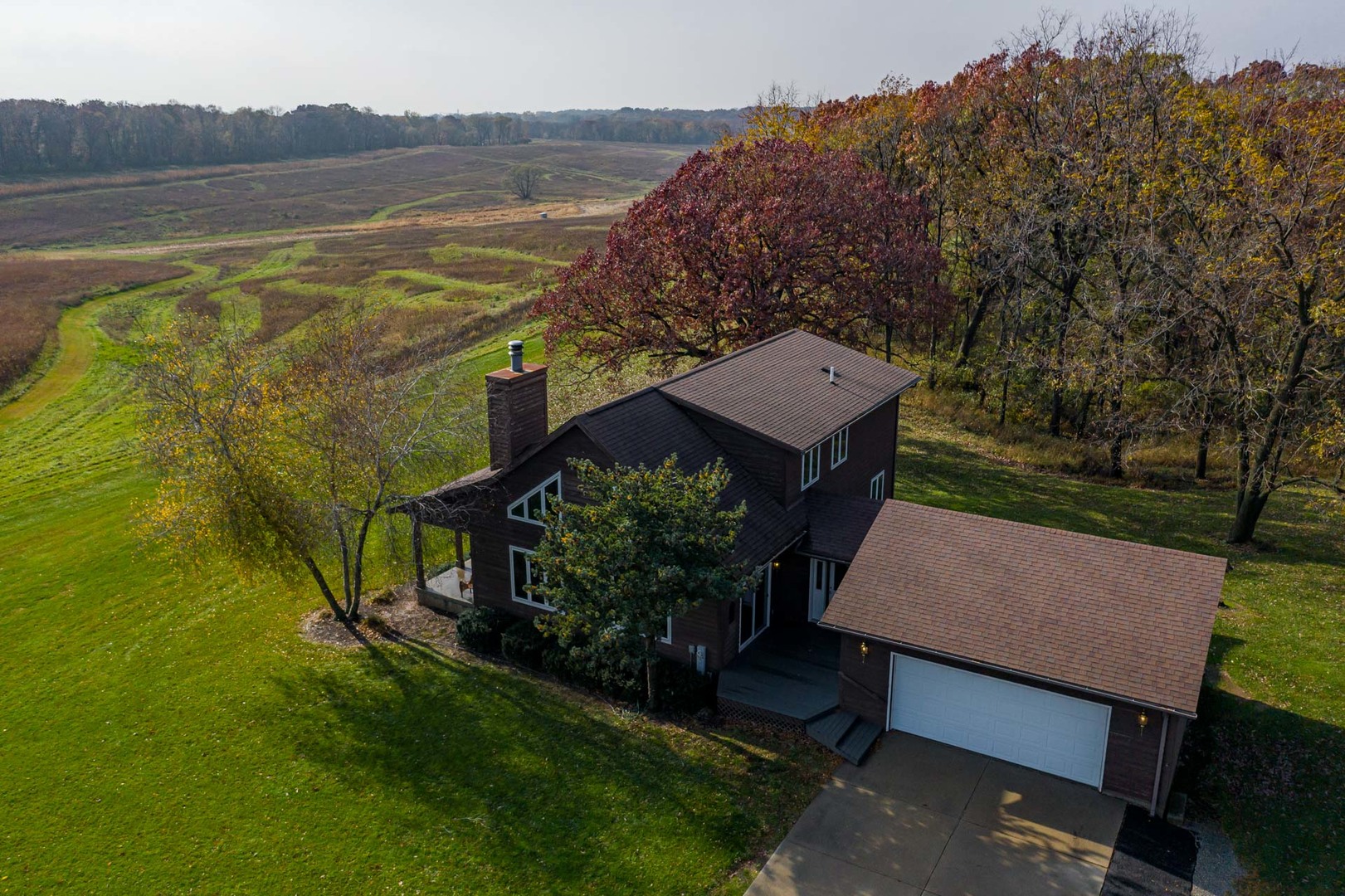 17501 Bishop Road Morrison, IL 61270 - Photo 63 of 167 a view of a terrace with a garden and lake view