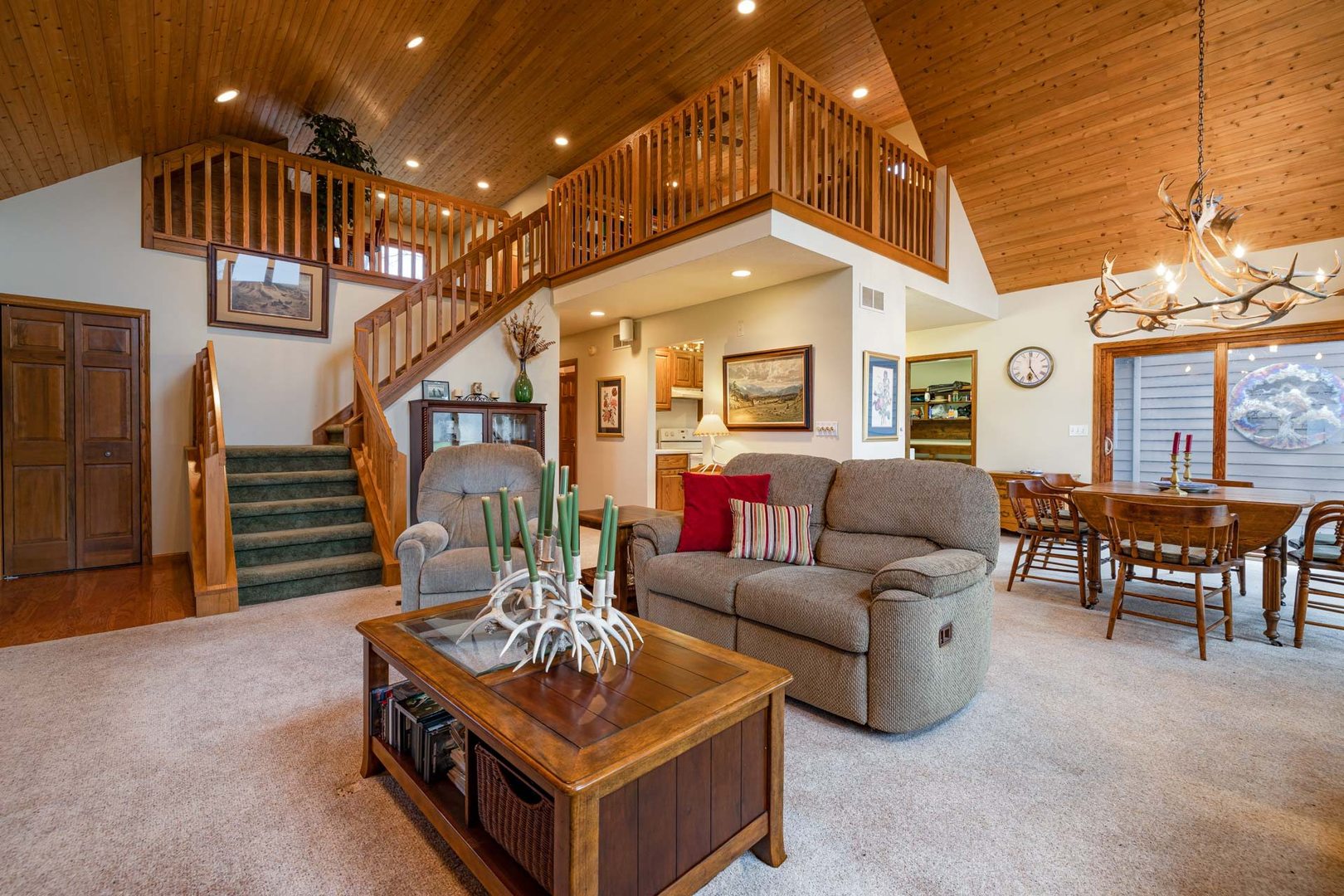 17501 Bishop Road Morrison, IL 61270 - Photo 73 of 167 a living room with furniture a fireplace and a chandelier