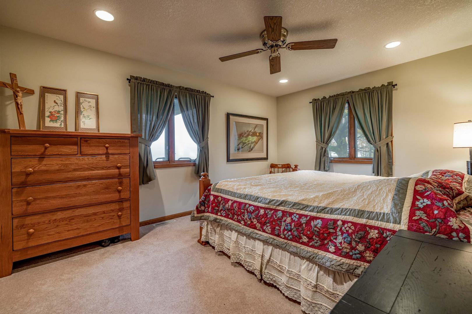 17501 Bishop Road Morrison, IL 61270 - Photo 80 of 167 a spacious bedroom with a bed and furniture
