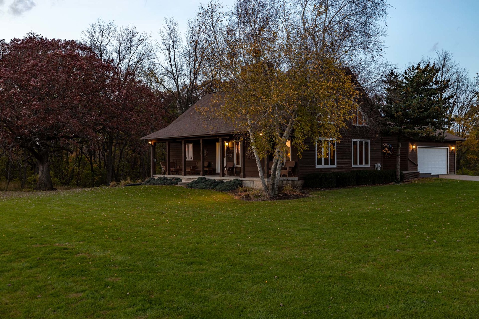 17501 Bishop Road Morrison, IL 61270 - Photo 91 of 167 a view of a house with a big yard potted plants and large trees