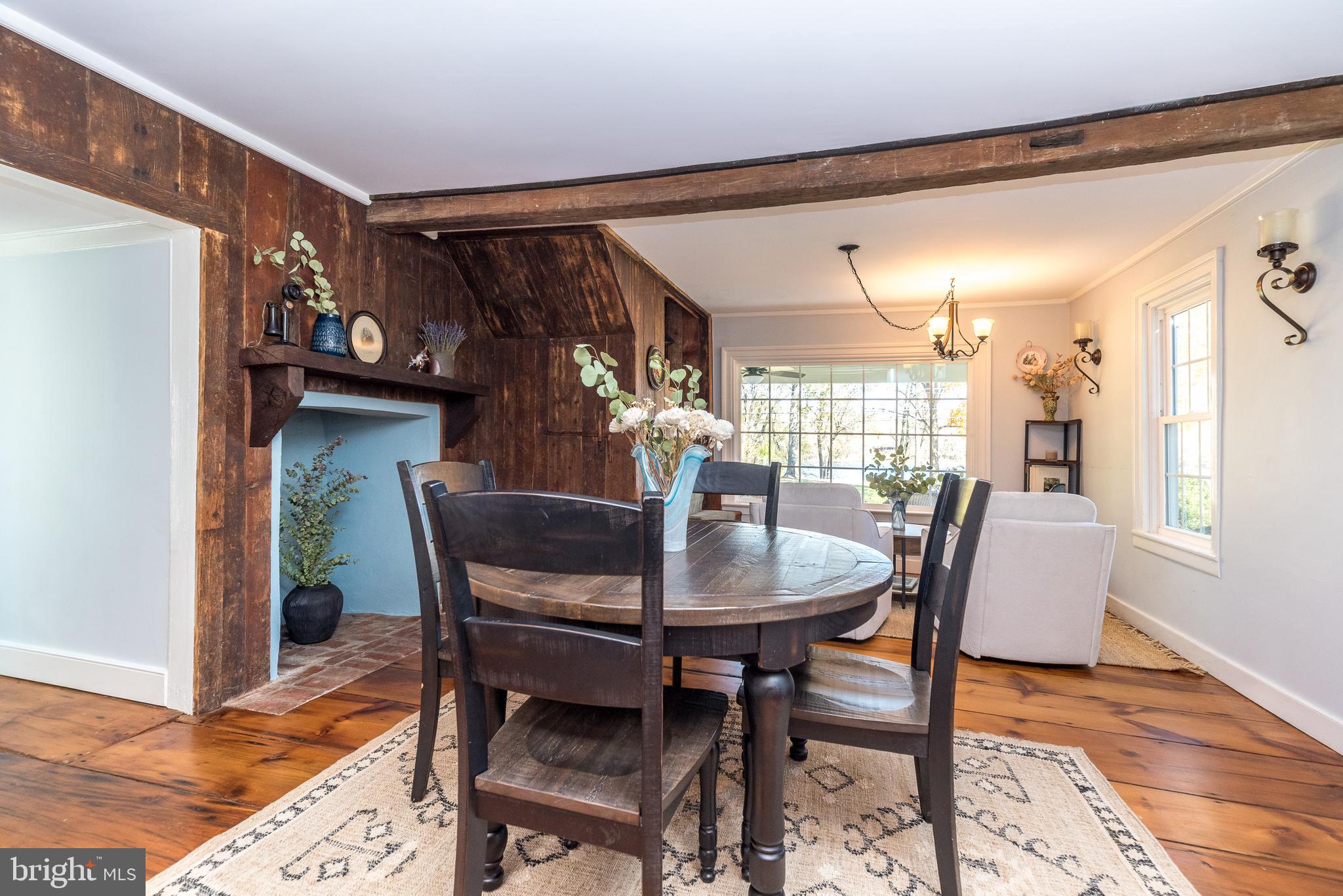 1442 River Road Upper Black Eddy, PA 18972 - Photo 19 of 65 a view of a dining room with furniture and wooden floor