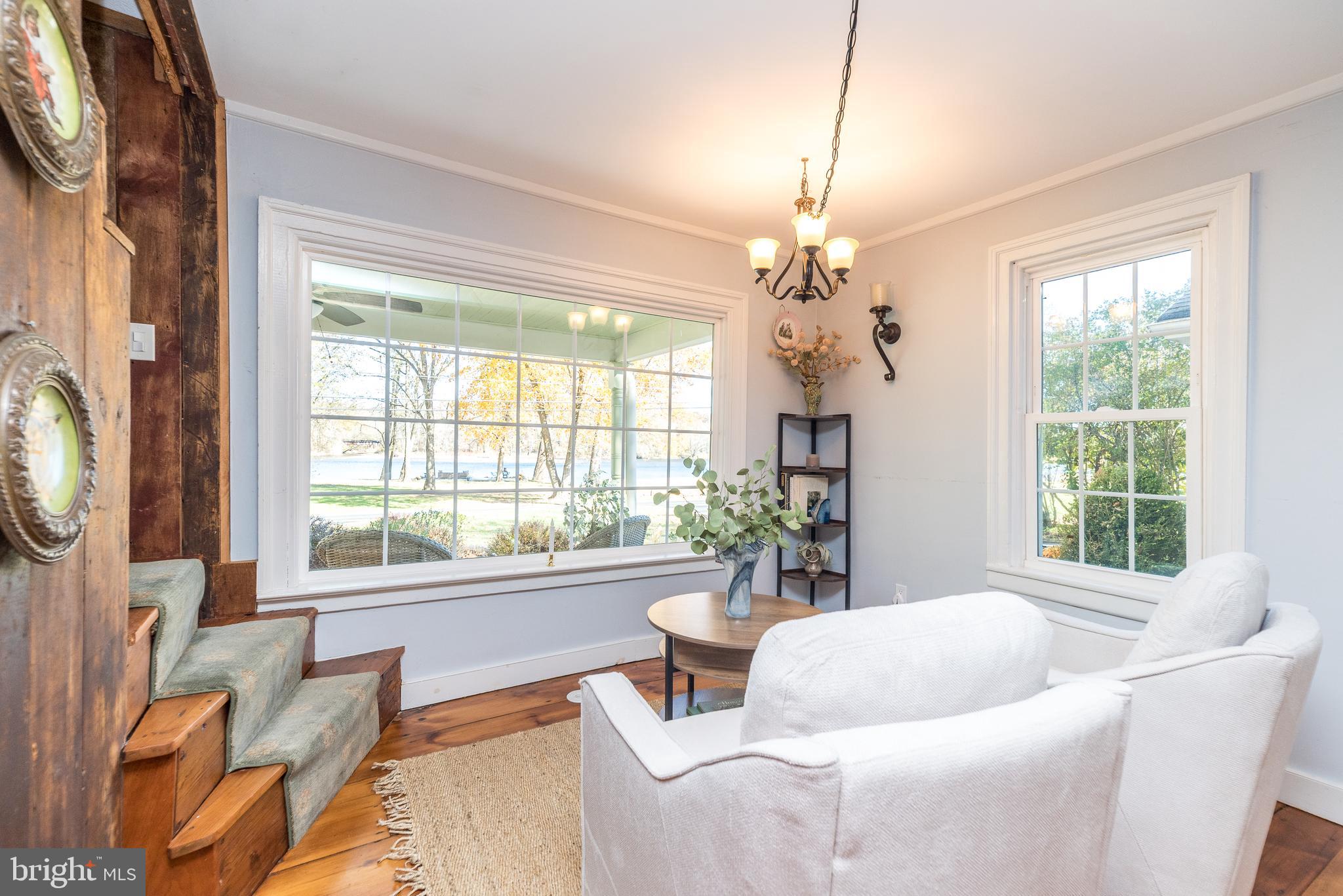 1442 River Road Upper Black Eddy, PA 18972 - Photo 21 of 65 a living room with furniture and a large window