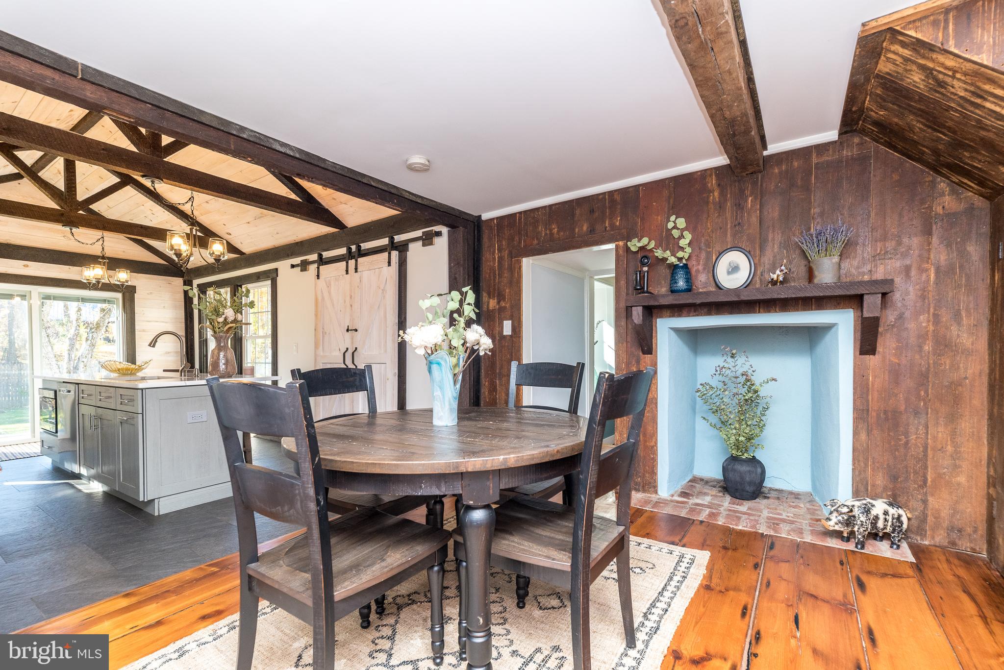 1442 River Road Upper Black Eddy, PA 18972 - Photo 23 of 65 a view of a dining room with furniture and wooden floor