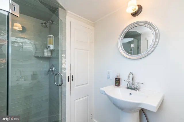 a view of a lake with houses in the back