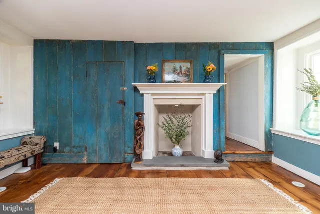 a living room with a fireplace