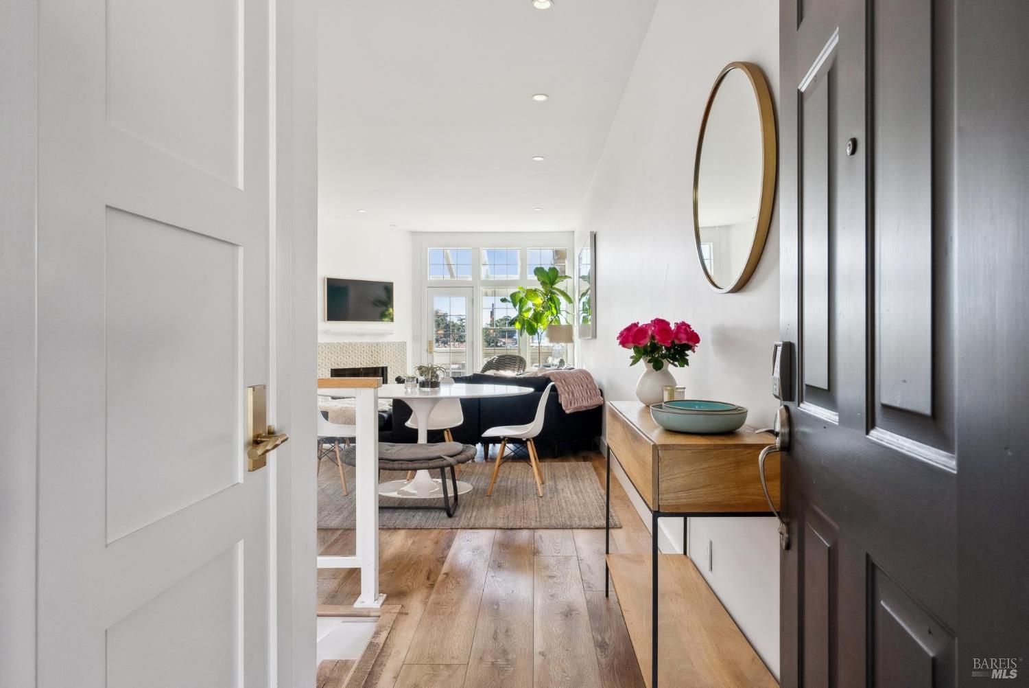 26 Heritage Drive San Rafael, CA 94901 - Photo 1 of 1 a dining room with furniture a potted plant and wooden floor