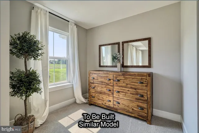 a bathroom with a sink double vanity and a mirror