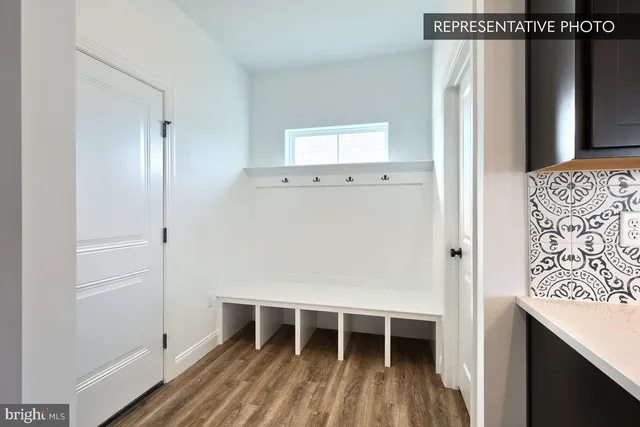 a view of kitchen with furniture and window