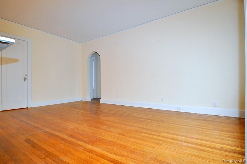 69 Harney Road, Unit 3A Scarsdale, NY 10583 - Photo 5 of 22 Large Living Room, with refinished hardwood floors, opens to the kitchen.