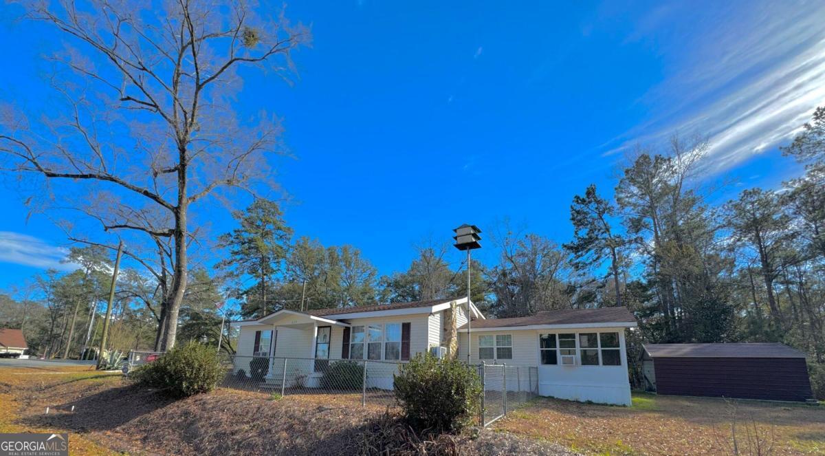 629 Deen's Landing Road Baxley, GA 31513 - Photo 1 of 1 a front view of a house with a yard