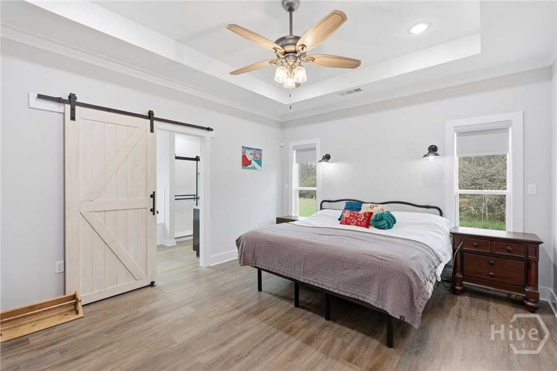 760 Fortson Compton Road Comer, GA 30629 - Photo 26 of 65 Large master suite with barn door