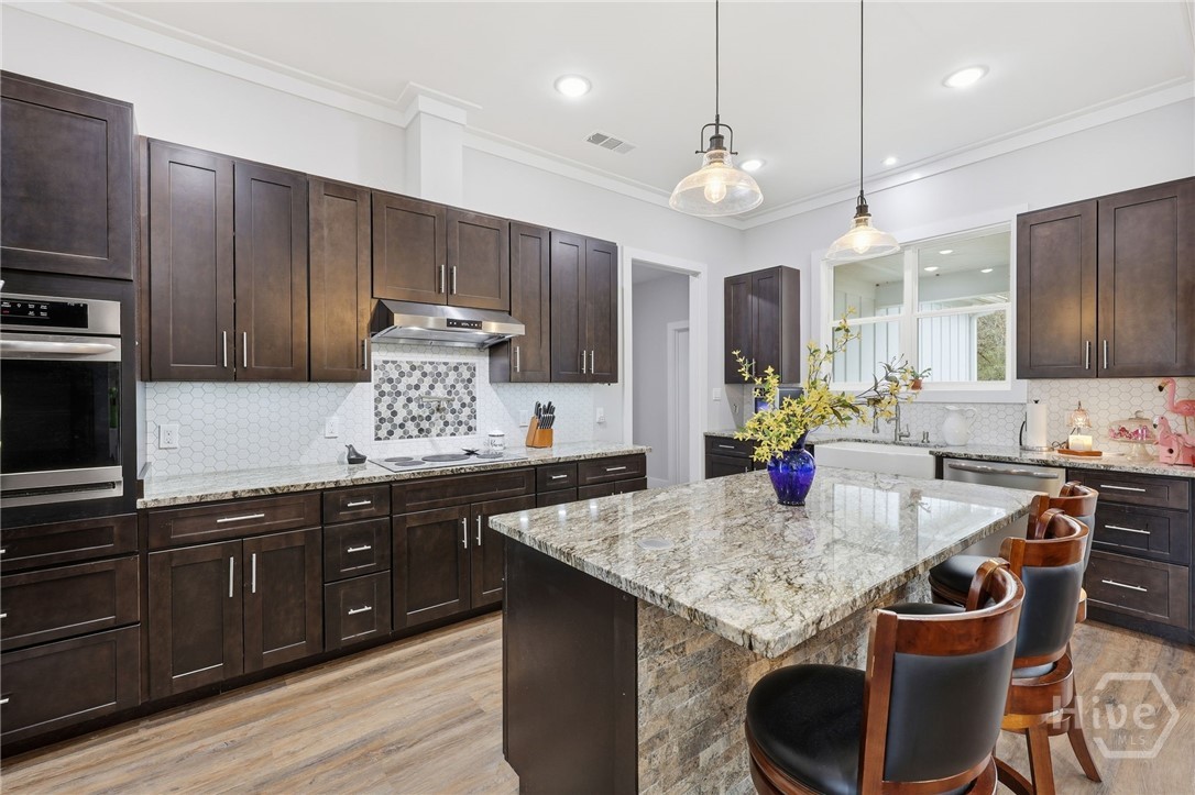 760 Fortson Compton Road Comer, GA 30629 - Photo 36 of 65 Granite countertops & serving bar with hidden microwave