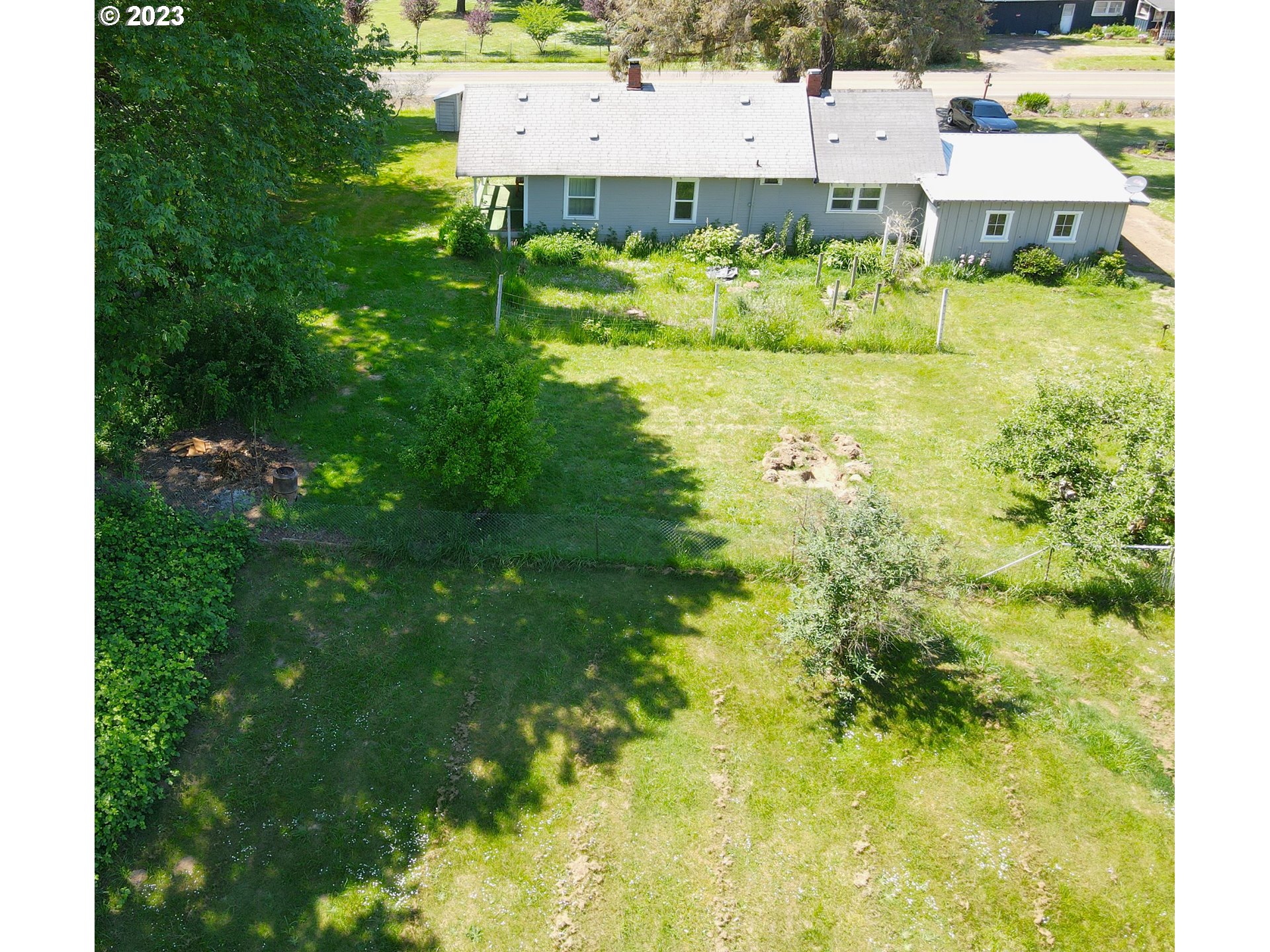 1001 Curtin Road Cottage Grove, OR 97424 - Photo 18 of 24 a view of a lake with houses
