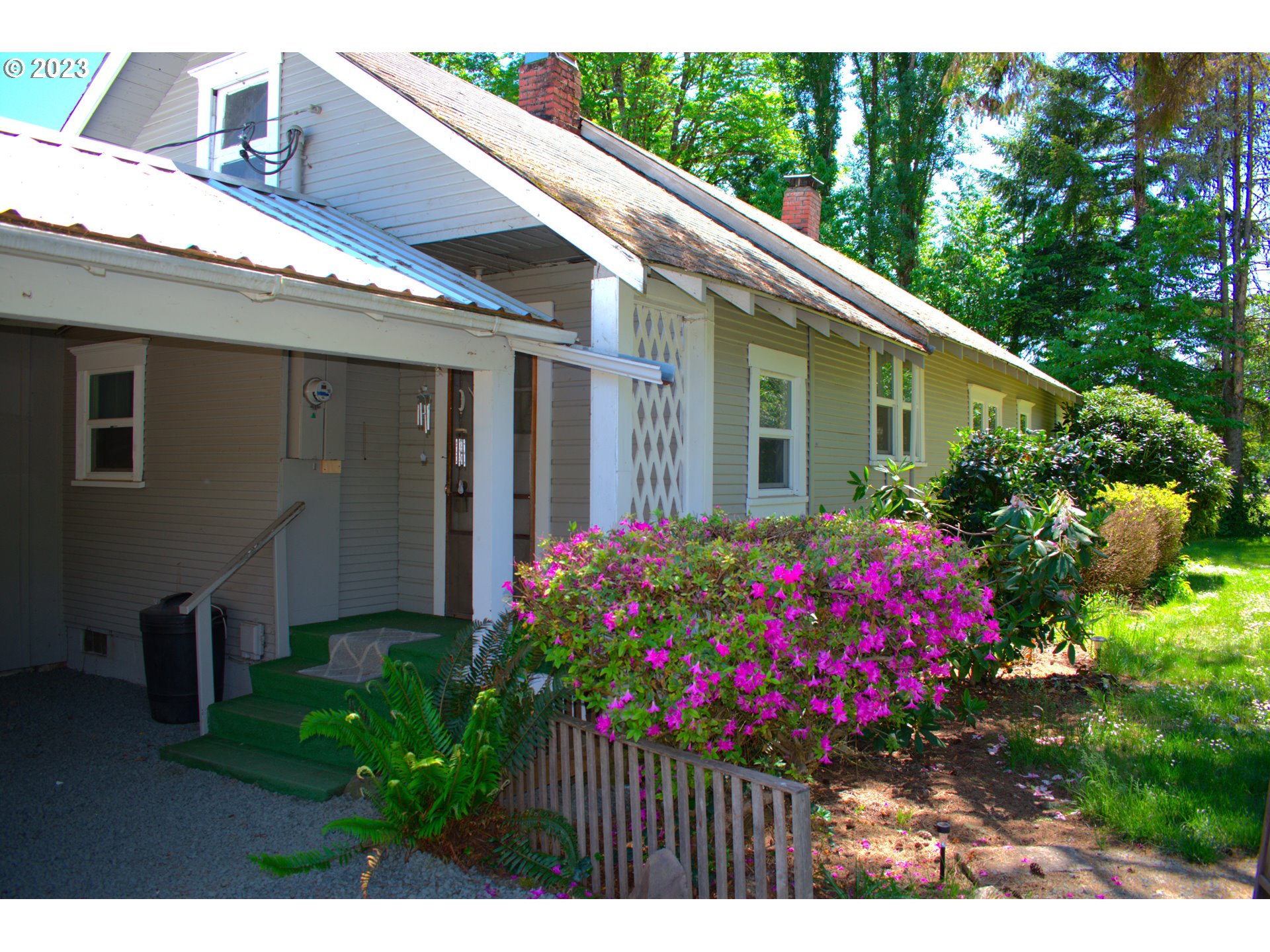1001 Curtin Road Cottage Grove, OR 97424 - Photo 23 of 24 a view of a backyard with garden