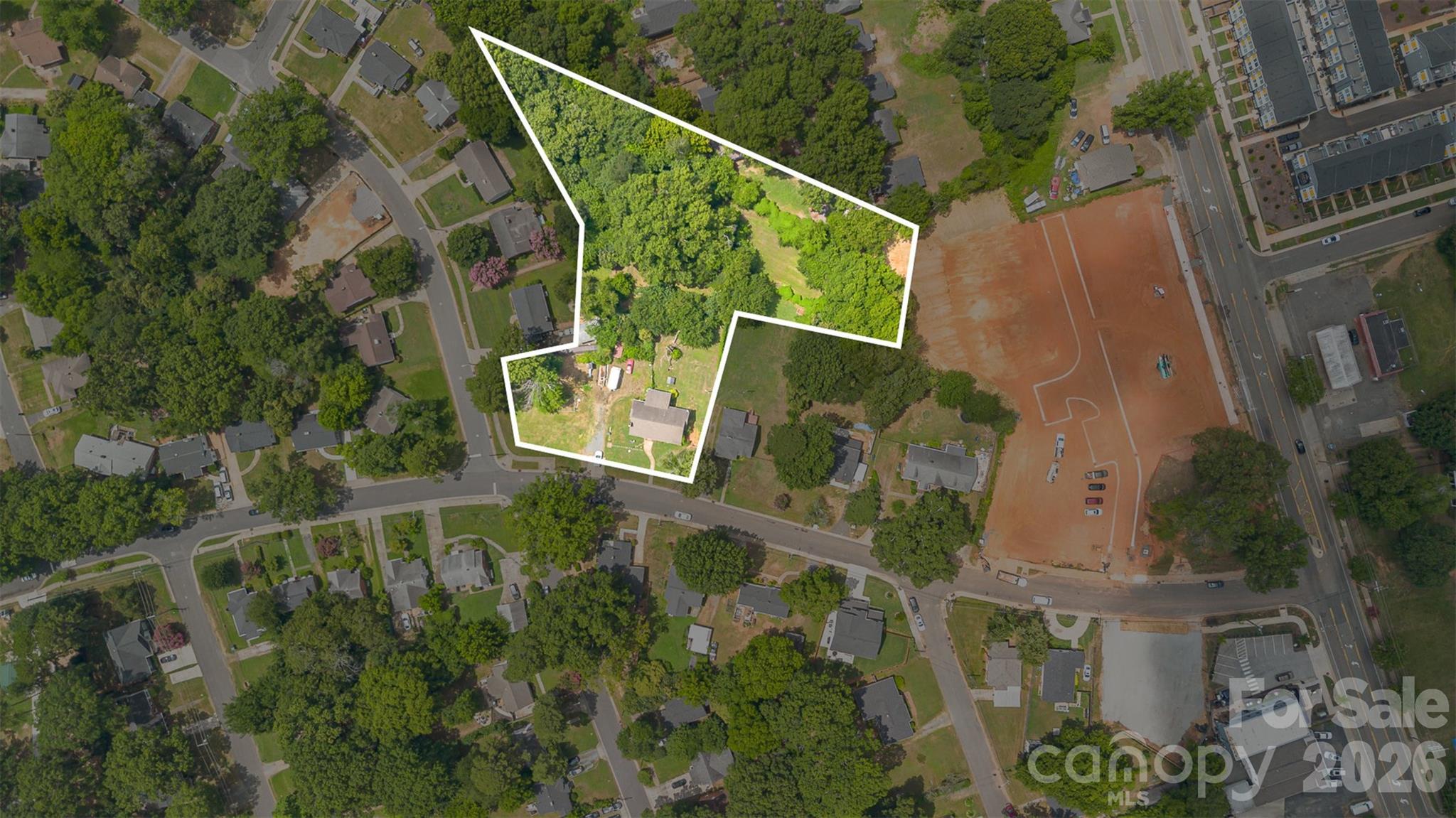 1318 Enderly Road Charlotte, NC 28208 - Photo 12 of 33 an aerial view of houses with yard