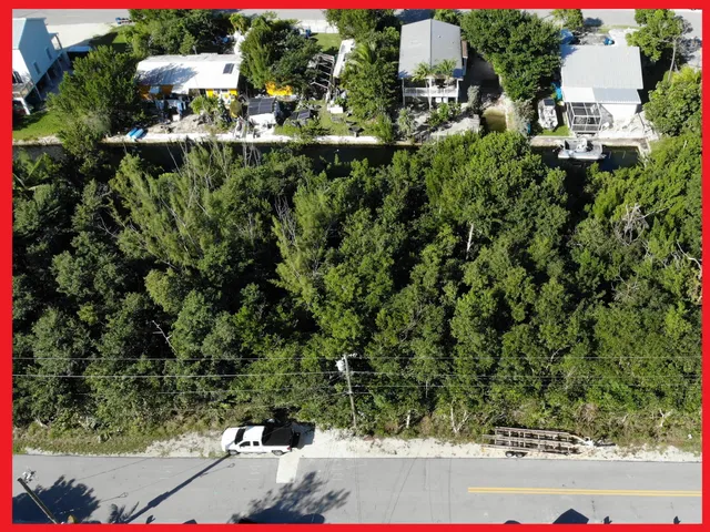 an aerial view of residential house with outdoor space