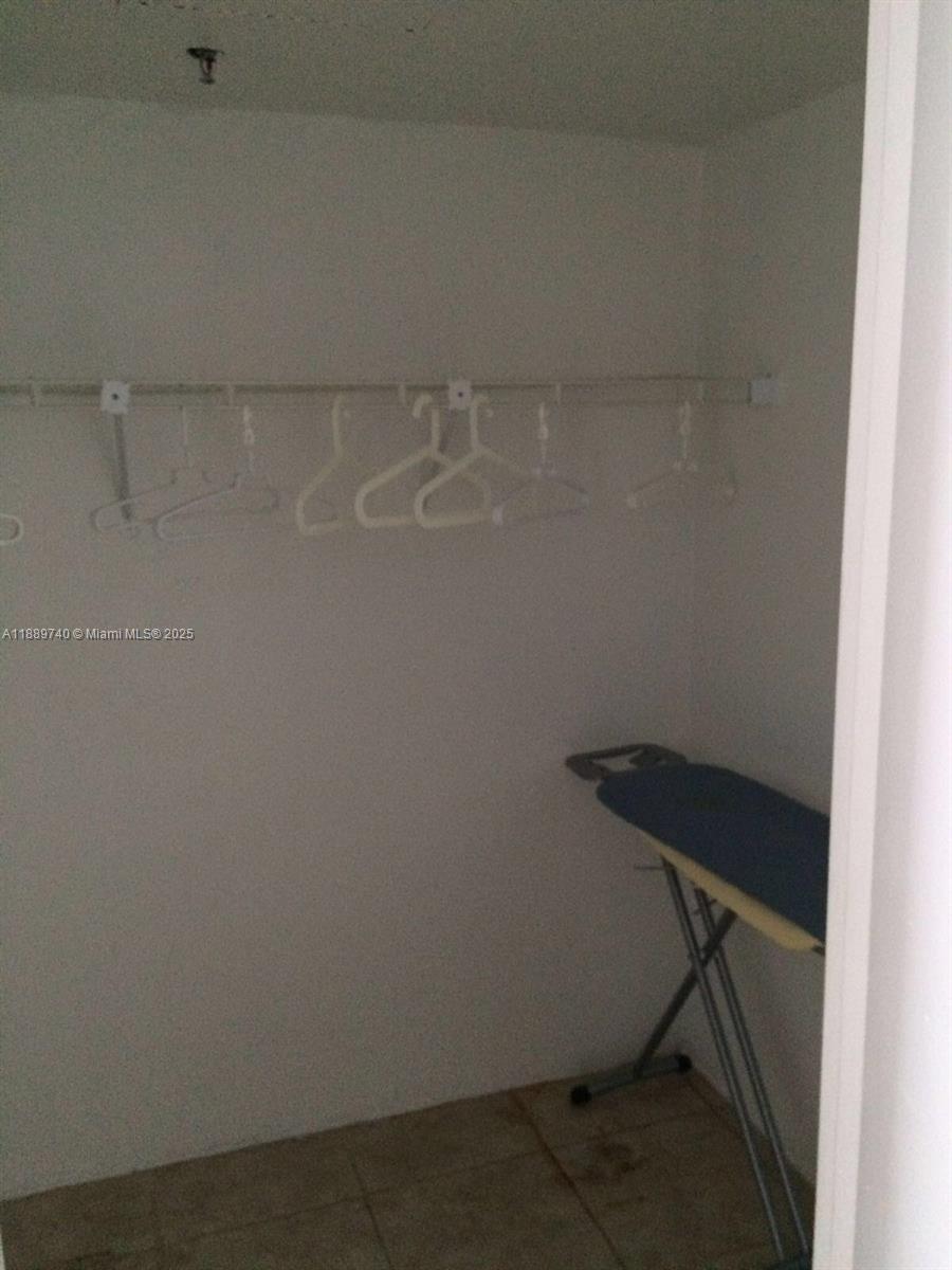 6345 Collins Avenue, Unit 937 Miami Beach, FL 33141 - Photo 17 of 27 a view of a room with racks on the wall