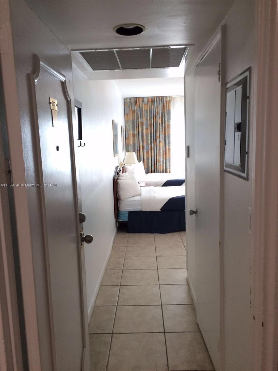 6345 Collins Avenue, Unit 937 Miami Beach, FL 33141 - Photo 25 of 27 a room with window and walk in closet