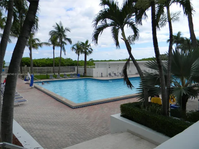 a view of outdoor space with swimming pool