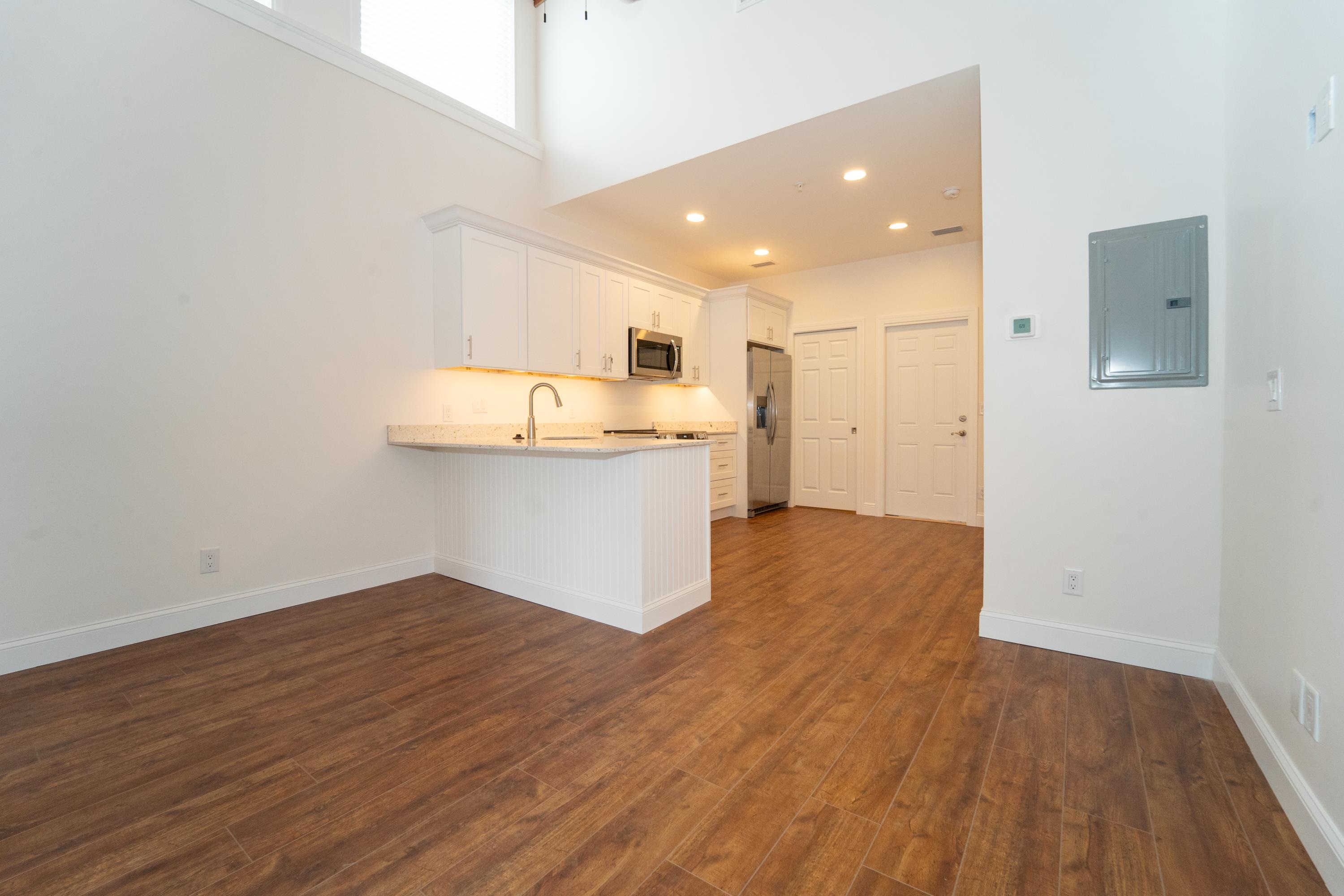 11 Aviles Street, Unit 3A St. Augustine, FL 32084 - Photo 3 of 17 a view of kitchen with wooden floor