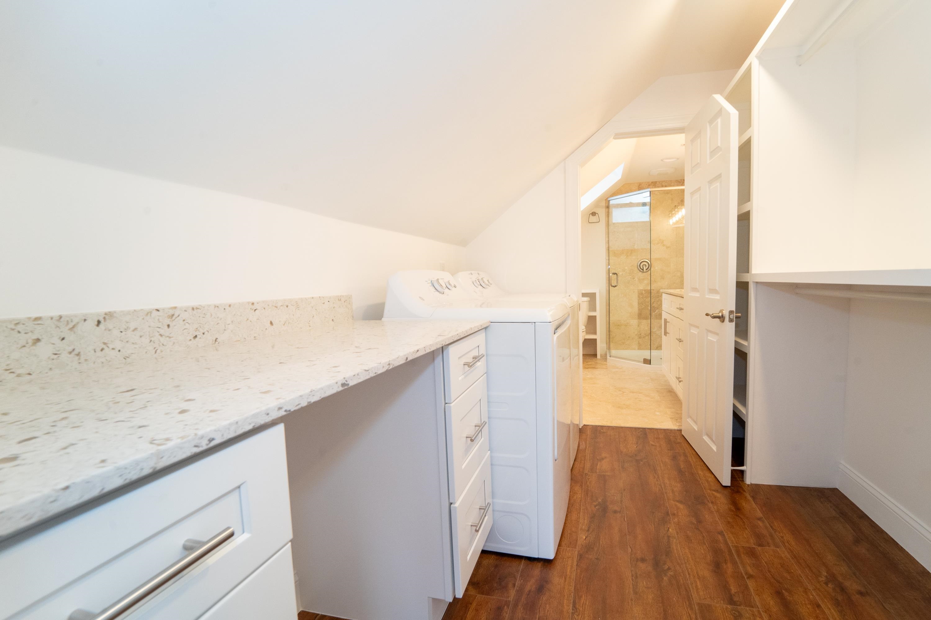 11 Aviles Street, Unit 3A St. Augustine, FL 32084 - Photo 6 of 17 a kitchen with a sink and wooden floor