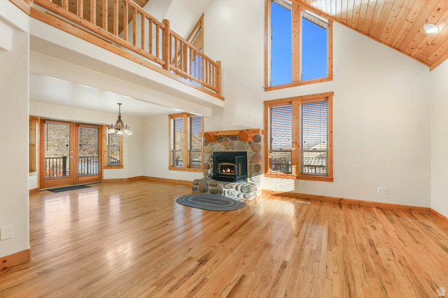 605 North Loafer Canyon Road Elk Ridge, UT 84651 - Photo 3 of 53 Living room with floor to ceiling windows.