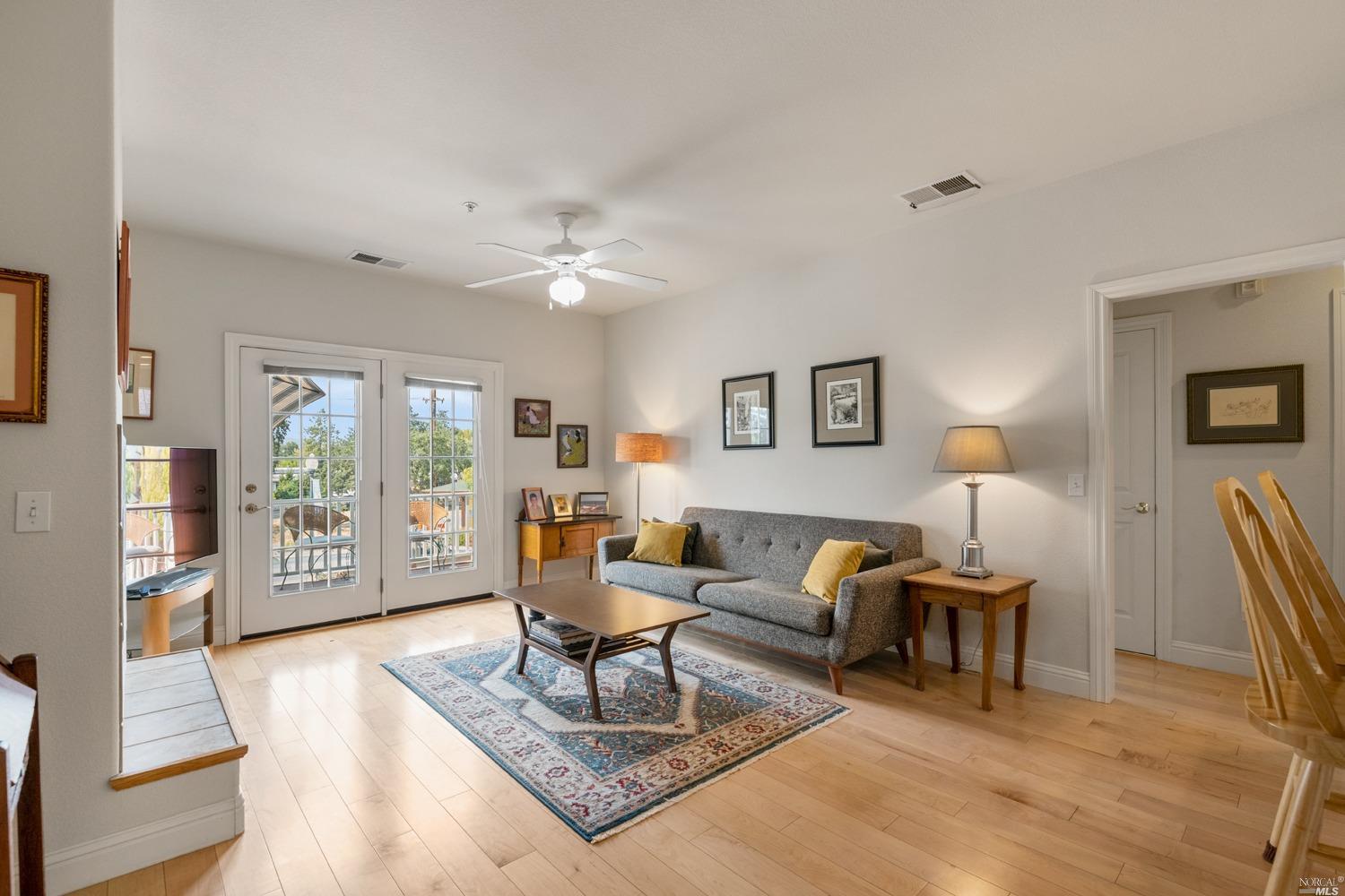 9024 Windsor Road Windsor, CA 95492 - Photo 1 of 1 a living room with furniture a table and a large window