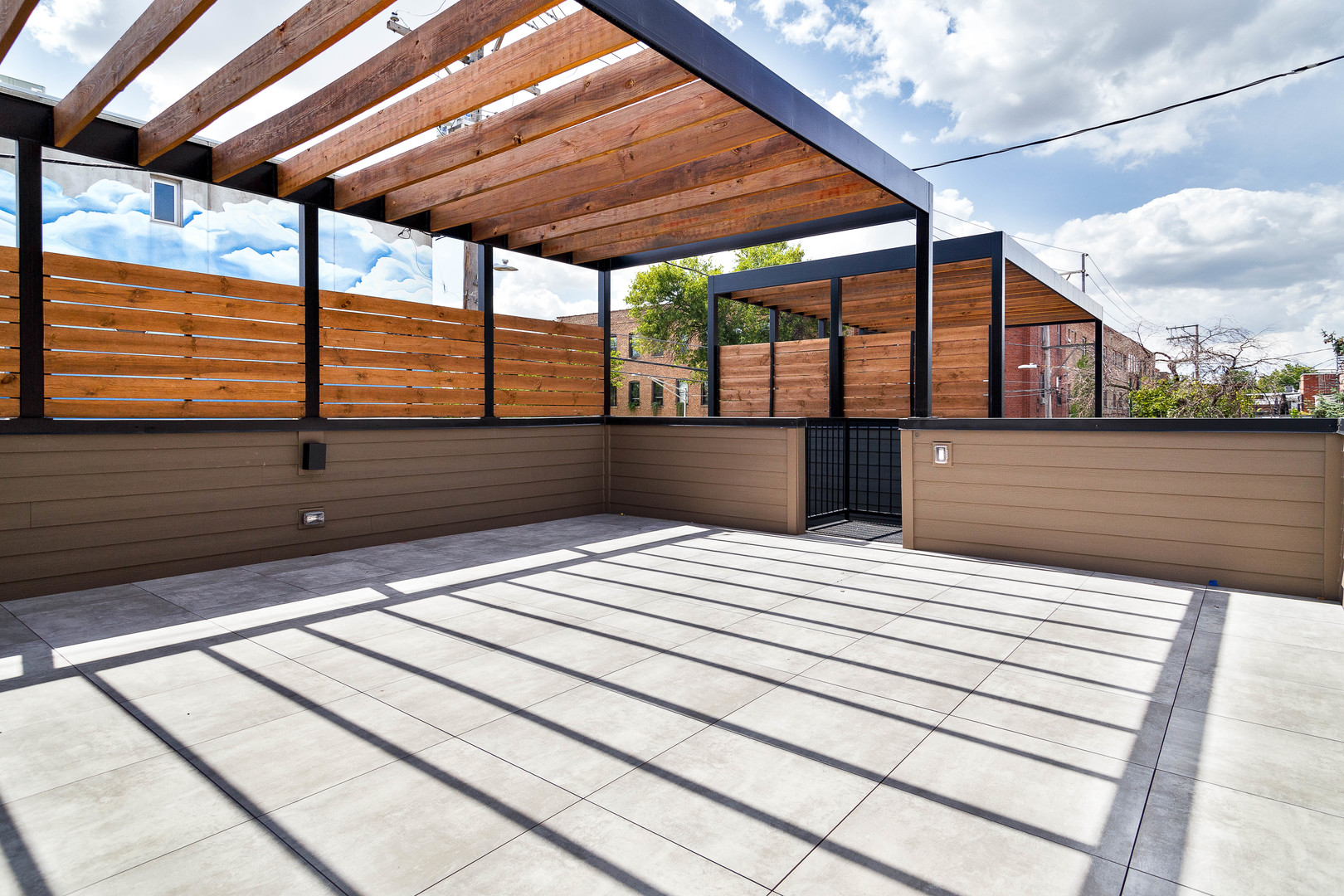 2055 West Race Avenue Chicago, IL 60612 - Photo 24 of 36 a view of a balcony with wooden floor