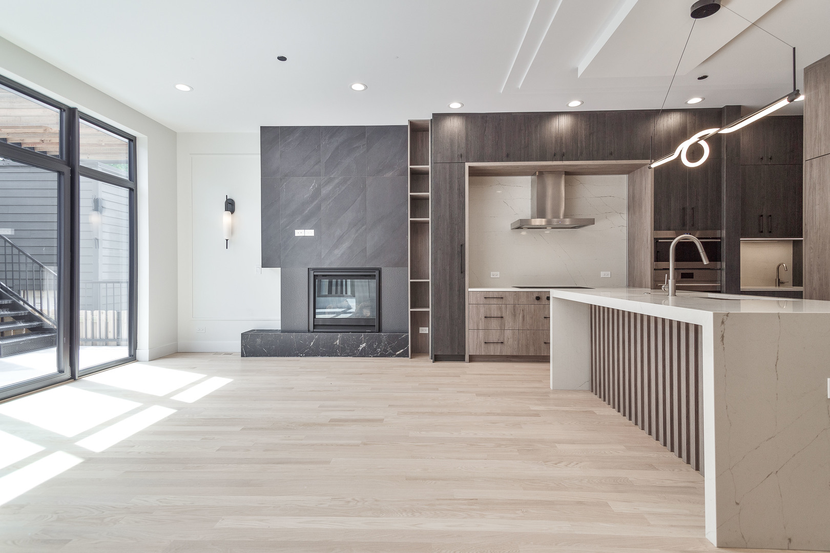 2055 West Race Avenue Chicago, IL 60612 - Photo 3 of 36 a view of a hallway with a kitchen
