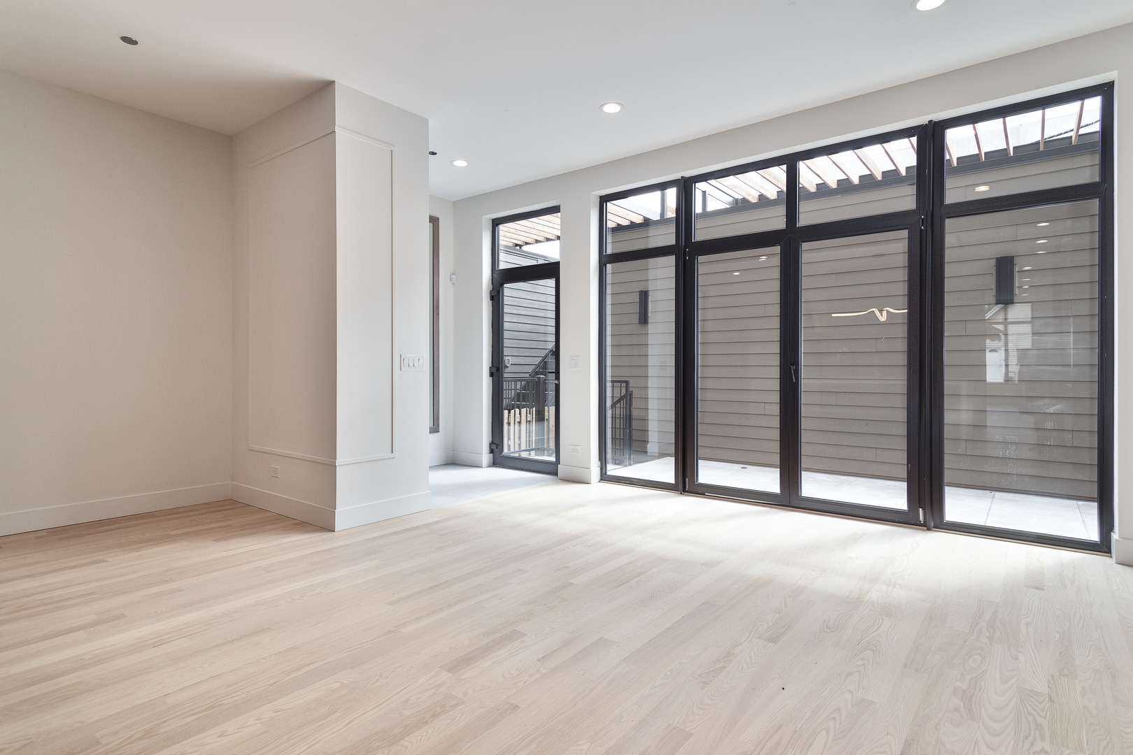 2055 West Race Avenue Chicago, IL 60612 - Photo 8 of 36 a view of an empty room with a balcony
