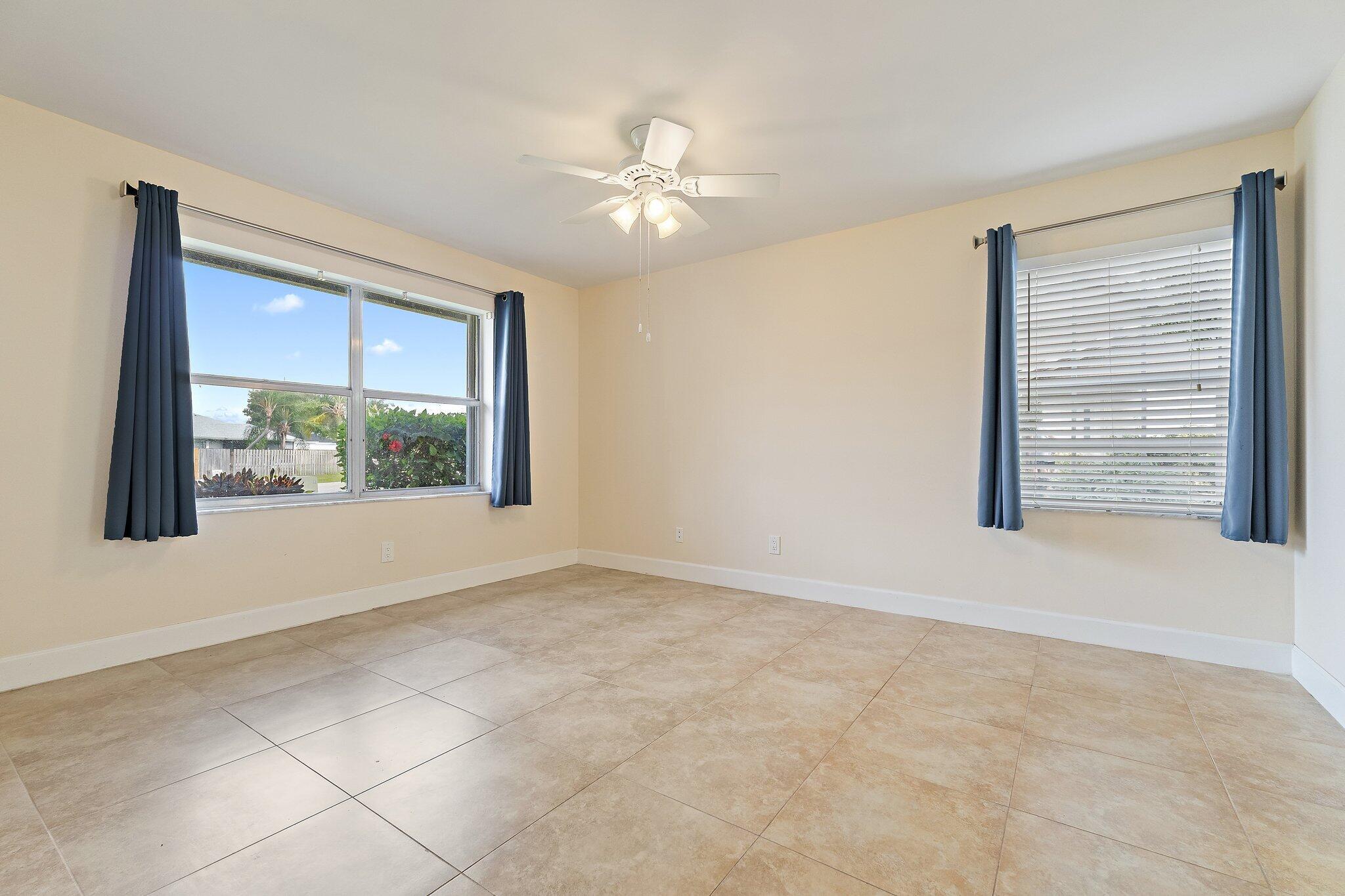 109 Doe Trail Jupiter, FL 33458 - Photo 11 of 26 a view of an empty room with a window