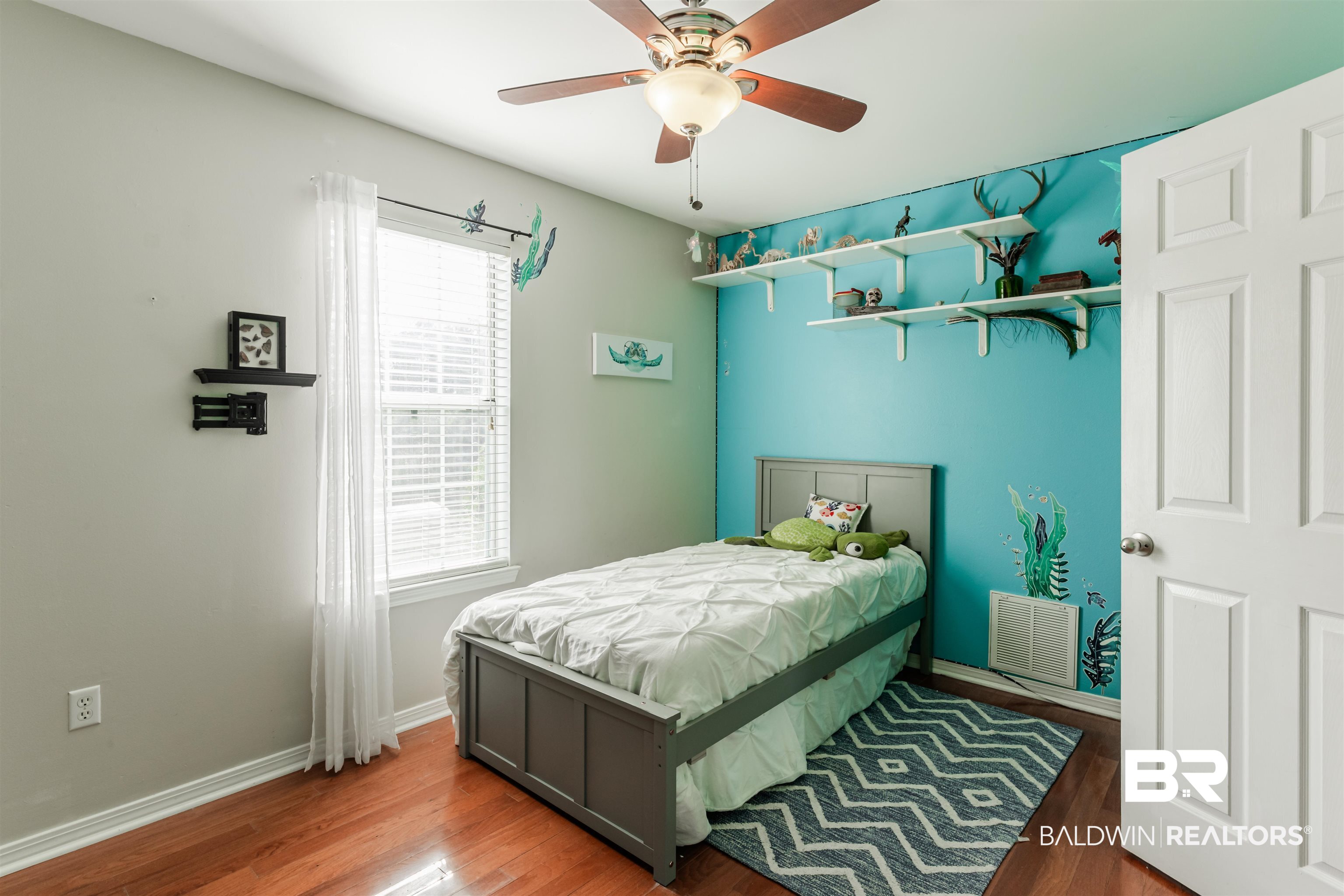 3844 Isabel Way South Mobile, AL 36693 - Photo 39 of 49 Bedroom with hardwood / wood-style floors and ceiling fan