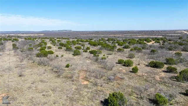 a view of beach and mountain