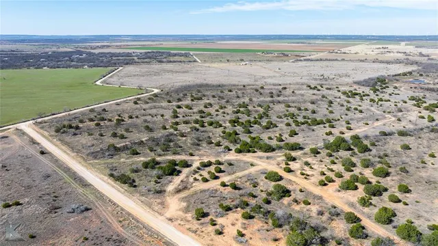 a view of a lake with a beach