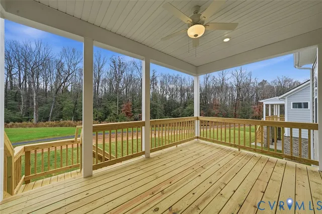 a view of a balcony with wooden floor