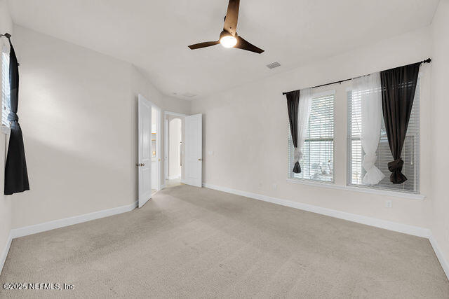 61 Spindrift Court St. Augustine, FL 32092 - Photo 13 of 61 a view of an empty room with a window